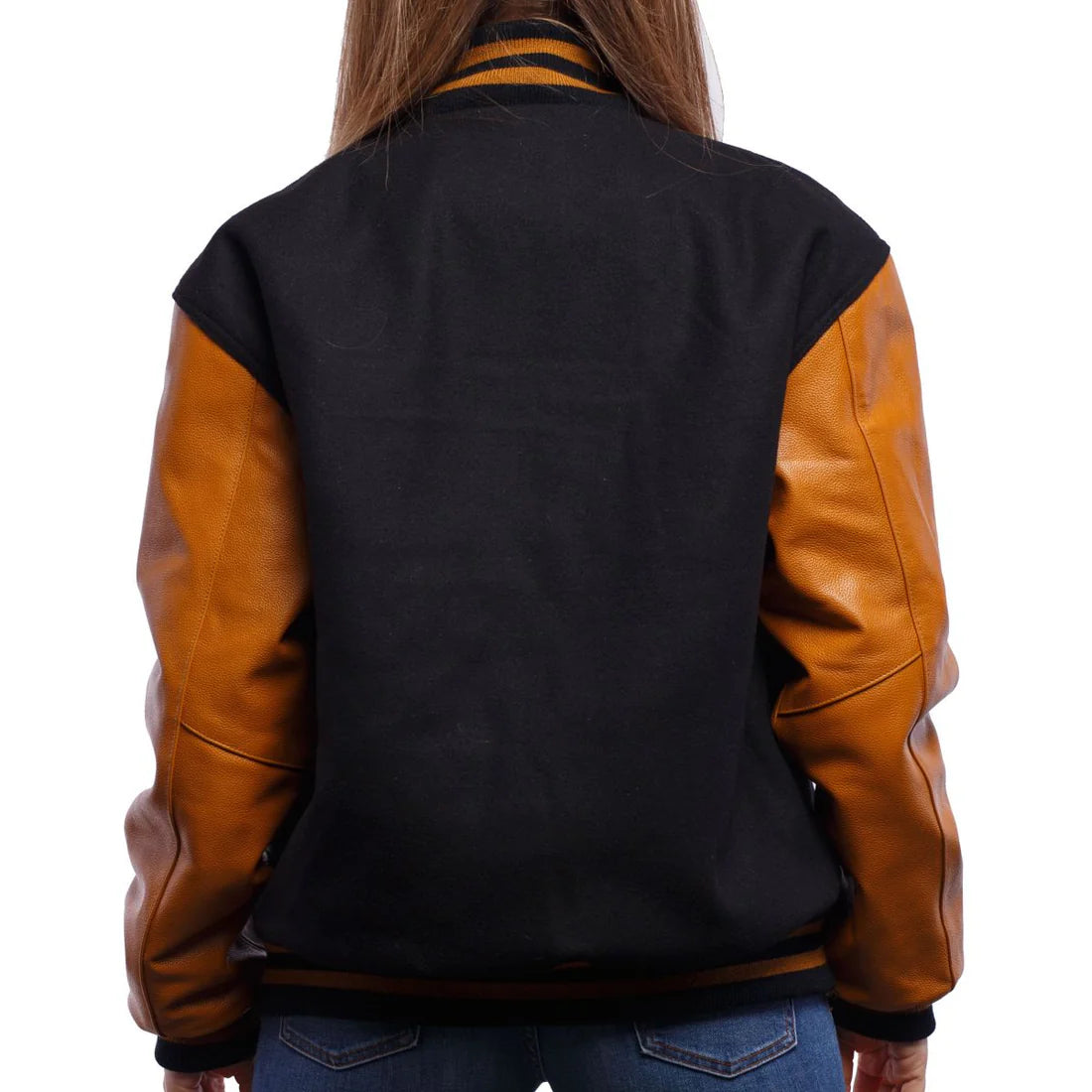 Black and brown varsity jacket worn by a person on a white background