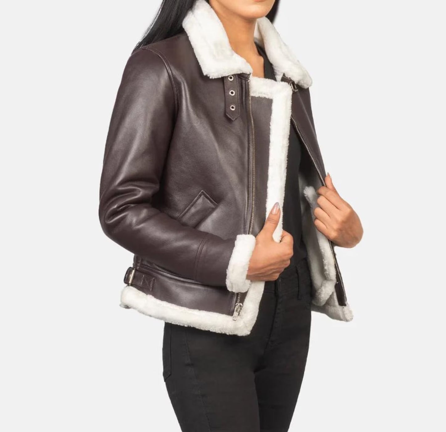 Brown leather jacket with white fur lining worn by a person on a white background