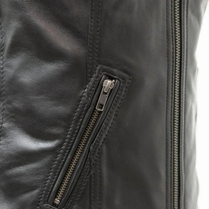 Close-up of a black leather jacket with a zipper detail on a white background