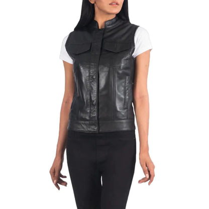 Black leather vest worn by a person on a white background